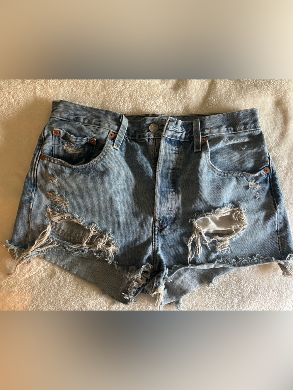 Levi's Ripped Light Blue Denim Cutoff Shorts